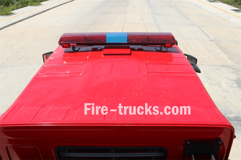 Fire truck with siren on cabin top